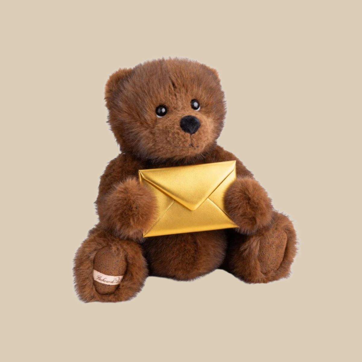 Bukowski beer die een gouden envelop vasthoudt, dit staat symbool voor het geven van een giftcard of cadeaubon