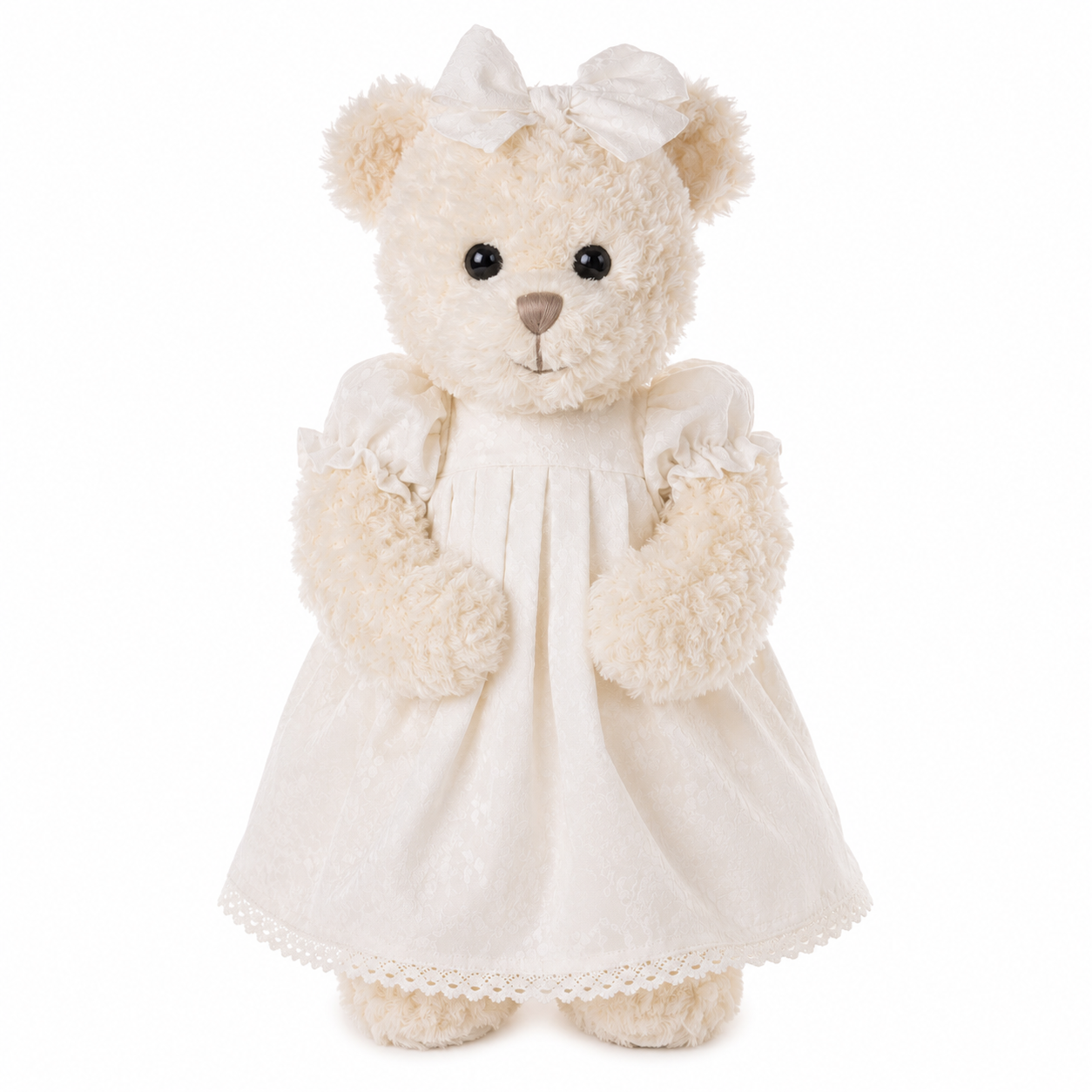 Grote witte teddybeer Selma van Bukowski Sweden met broderie jurkje, strik op haar hoofd en ultrazachte pluche.