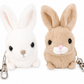 Zeus Beige en Hera Wit Konijntje Bag Charm van Bukowski Sweden in beige, 8 cm, voor aan tas, rugzak of sleutelbos.